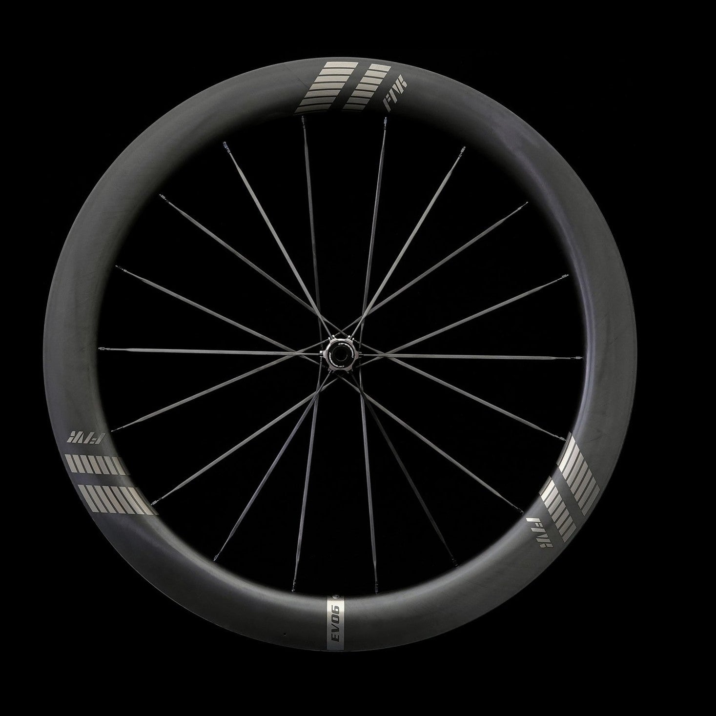 farports Black bicycle wheel on a black background