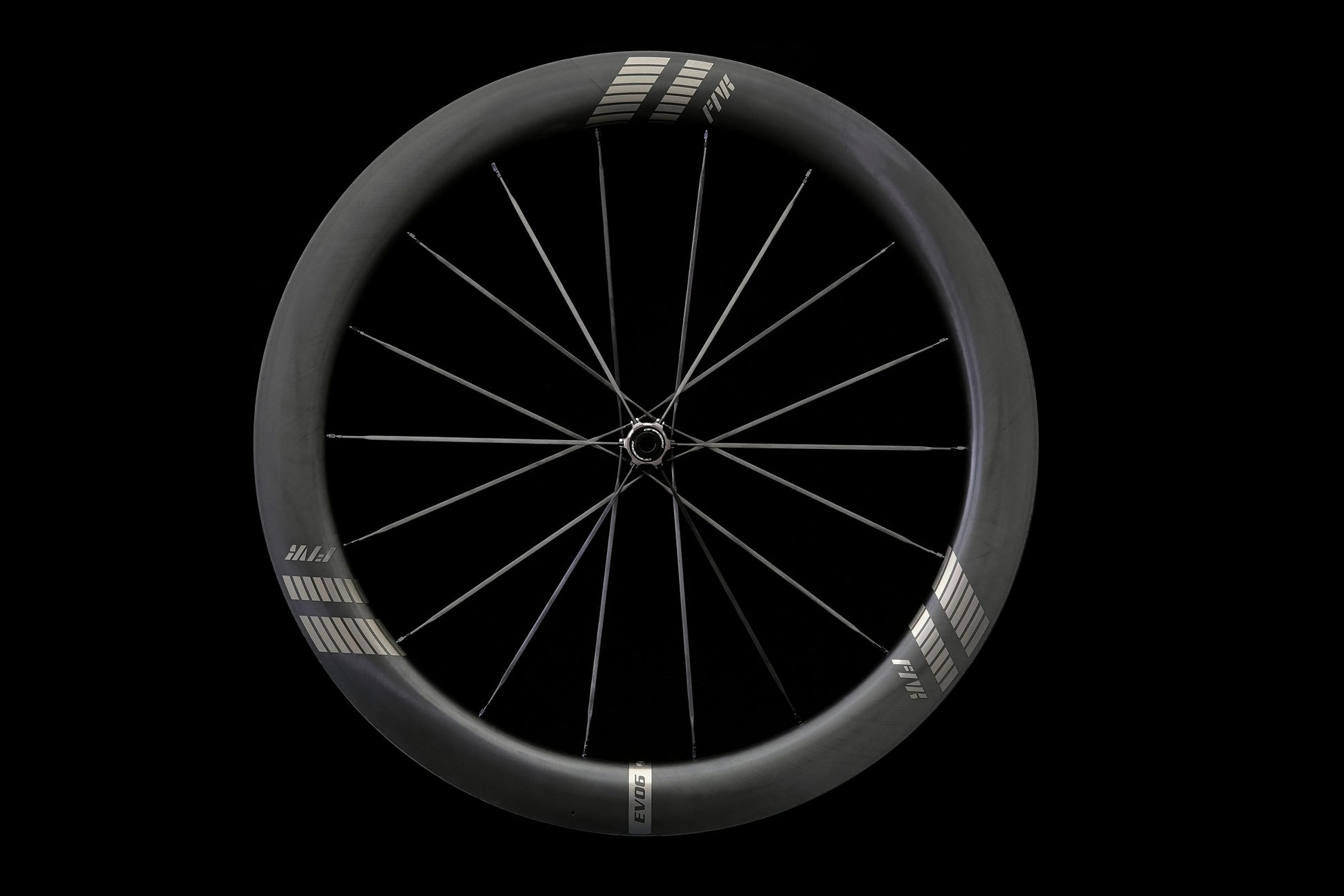 farports Black bicycle wheel on a black background